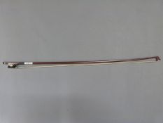 An anonymous violin bow with fleur de lys and mother of pearl inlay, 63.