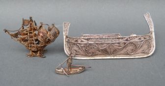 A silver filigree model of a boat, marked 917, possibly Maltese, 9.