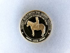 A deluxe cased 1998 14ct gold Samoa 50 dollar coin, 7.776g, with certificate, no.