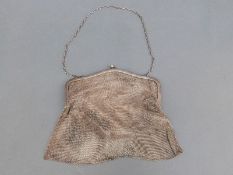 A hallmarked silver mesh purse with import marks for Glasgow 1923,