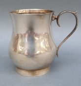 A hallmarked silver baluster shaped christening tankard, Birmingham 1963 maker Joseph Gloster Ltd,