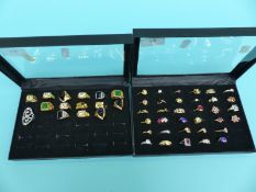 Over 40 rings set with various gemstones
