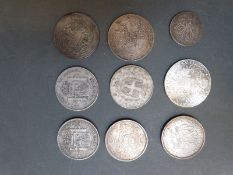 A cachet of various silver coins to include Singapore trade dollars, Maria Theresia 2x 1888,
