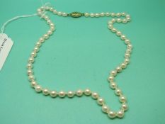 A strand of cultured pearls with 9ct gold clasp