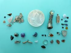 A mother of pearl pin dish, silver ingot, silver brooch, silver charms,