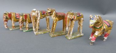 Six painted Indian animals, possibly part of a Noah's Ark or similar toy,