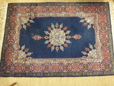 A rug with navy ground,