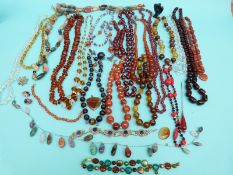 A collection of beaded necklaces to include early glass beads, amethyst necklace,