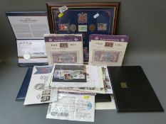 A collection of various UK coin and stamp covers etc,