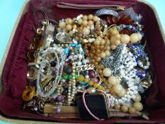 A collection of costume jewellery to include pearls, silver, necklaces, glass beads,