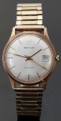 Garrard 9ct gold gentleman's automatic wristwatch with date aperture and two tone hands and baton