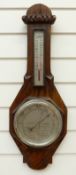A British made aneroid wall barometer/thermometer,