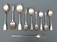 A small quantity of hallmarked silver spoons and a silver pickle fork,