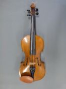 A 20thC violin with 36cm two piece flame back and bow