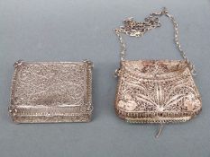 A white metal small filigree purse 5 x 4.5cm and a white metal filigree continental box 5.3 x 4.