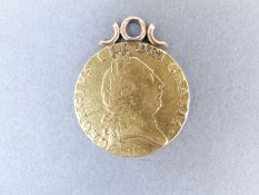 A 1790 gold spade guinea on hoop mount