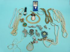 A collection of costume jewellery to include faux pearls, marcasite brooches,
