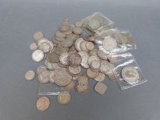 Approximately 500g of mixed UK and overseas silver coinage,