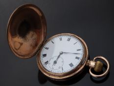A gold plated full hunter keyless winding pocket watch with subsidiary seconds dial,