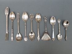 Ten various hallmarked silver and white metal collectors spoons, filigree fork etc,