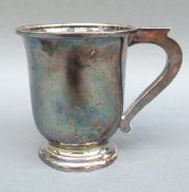 A hallmarked silver christening tankard or mug, Birmingham 1946, maker's mark rubbed 95g,