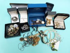 A collection of costume jewellery and watches including faux pearls,