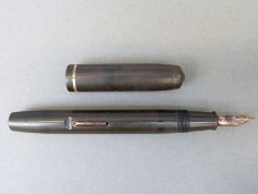 A Conway Stewart fountain pen with 14ct gold nib