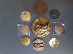 A Queen Victoria 1837-1897 bronze commemorative plaque together with other bronze and brass