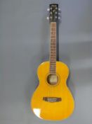 Ibanez acoustic guitar fitted with six steel string on individual tuning pegs