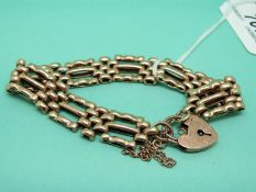 A 9ct gold gate bracelet and a 9ct gold padlock clasp, weight 18.