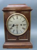 A Winterhalder and Hofmeier shelf clock in mahogany case the silvered Roman dial with spade hands,