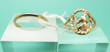 A 22ct gold and platinum wedding ring (2g) and a 9ct gold ring (1.