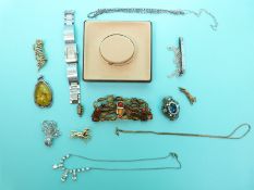 Two silver chains, an amber pendant, brooches, paste necklace, yellow metal horse brooch etc.