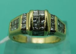 An 18ct gold ring set with 40 princess cut diamonds, total diamond weight approximately 1.