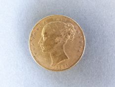 An 1861 shield back bun head Victoria gold full sovereign