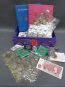 An amateur coin collection of two collector's albums,