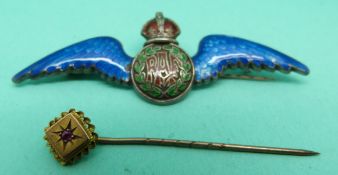 A silver and enamel RAF sweetheart brooch and a 9ct gold pin set with a ruby