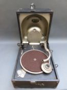 A Decca wind-up portable gramophone with horn in the lid