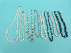 Eight pearl necklaces including a large single strand of Tahitian cultured pearls,