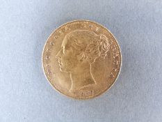 An 1857 shield back bun head Victoria gold full sovereign
