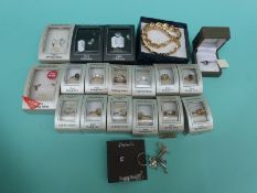 A collection of costume jewellery including silver rings,
