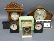 A collection of various clocks and timepieces to include a c1900 wooden cased classical style