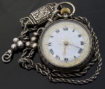 A silver keyless winding pocket watch with Roman numerals, gold hands,