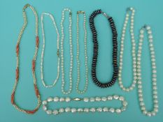 Eight pearl necklaces including a large single strand of freshwater pearls,
