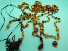 Three amber necklaces made up of opaque,