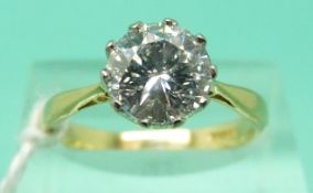 An 18ct gold ring set with a round brilliant cut solitaire diamond of approximately 1.