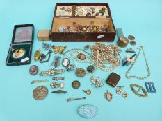 A collection of jewellery to include a micro mosaic brooch, silver fob, Cotswold hunting badge,