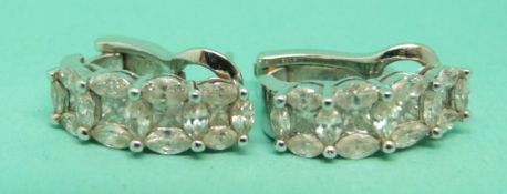 Splendore pair of 18ct white gold earrings each set with four princess cut diamonds and 13 marquise
