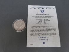 An 1890 USA Morgan dollar with certificate