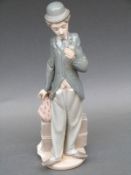 A Lladro figure of Charlie Chaplin